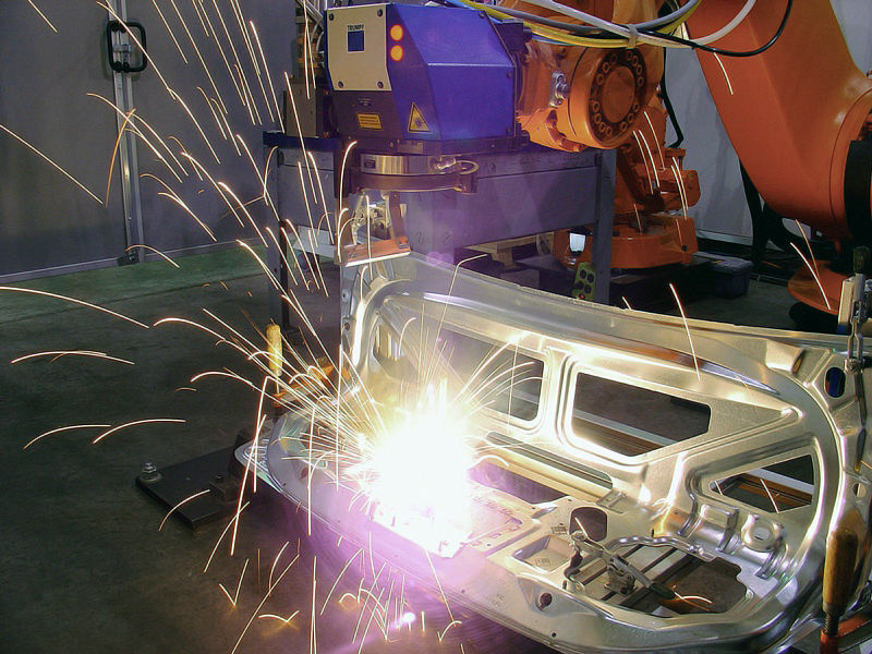 Remote laser welding of trunk lid components