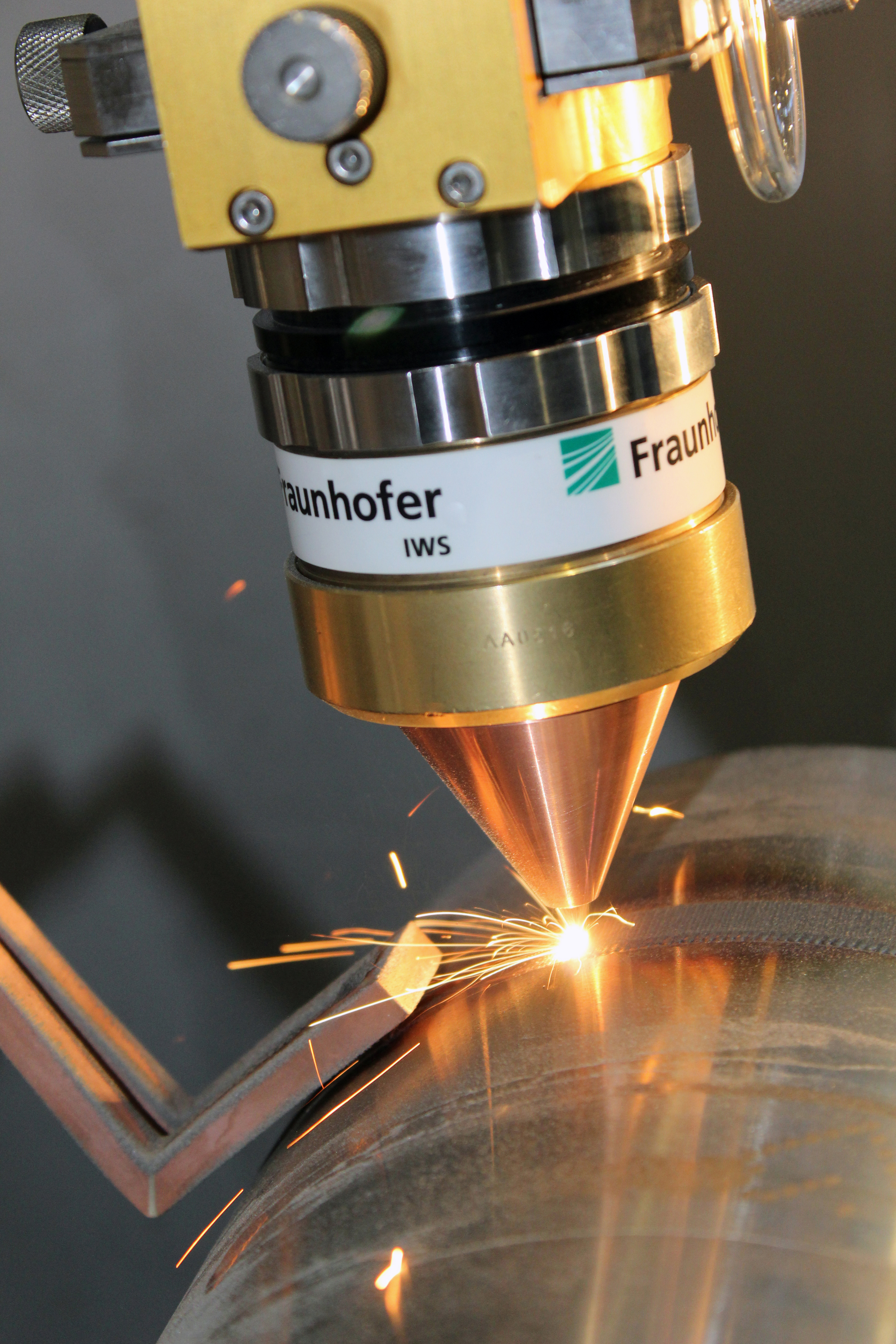 Laser buildup welding with a COAX laser processing head