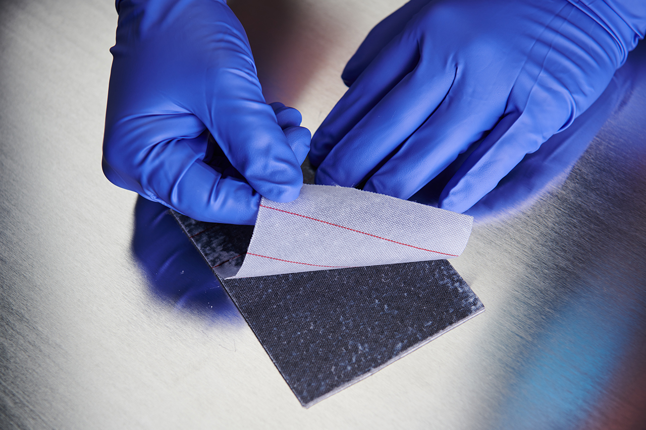 The patented surface preparation for thermal spraying by means of a peel ply enables defined roughening of FRP surfaces before functional coatings such as multilayer heating systems are applied. The patented surface preparation for thermal spraying by means of a peel ply enables defined roughening of FRP surfaces before functional coatings such as multilayer heating systems are applied.