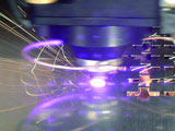 Fast laser cutting with highly dynamical additional axes