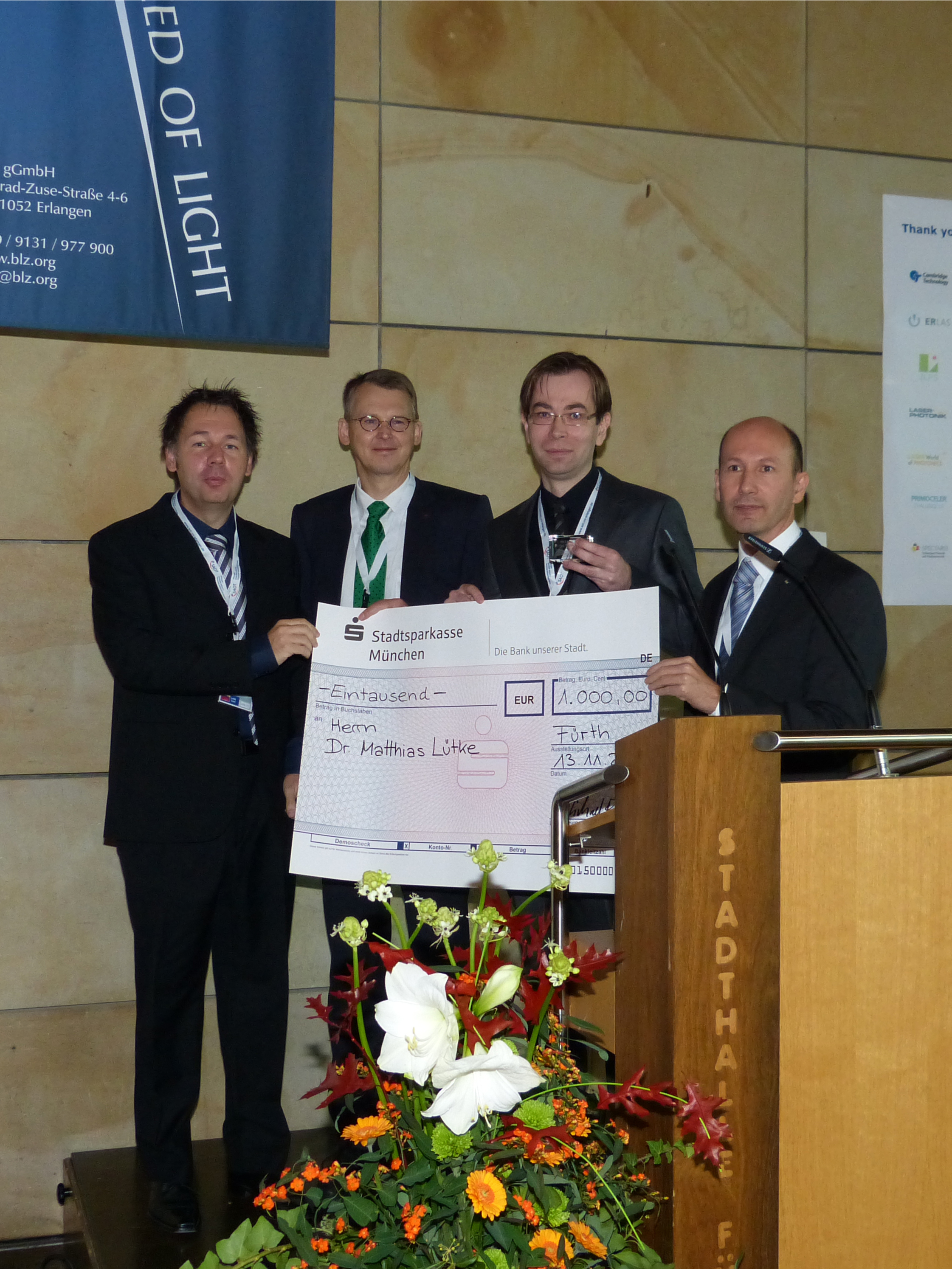 From the left: Professor Schmidt (Chair of Photonic Technologies), Professor Vollertsen (treasure of WLT), Dr. Lütke (lauderate), Professor Zäh (president of WLT)