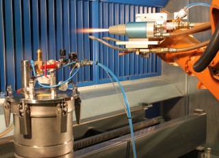Suspension-HVOF-Spraying process with pressure-controlled lab suspension feeder unit at  Fraunhofer IWS