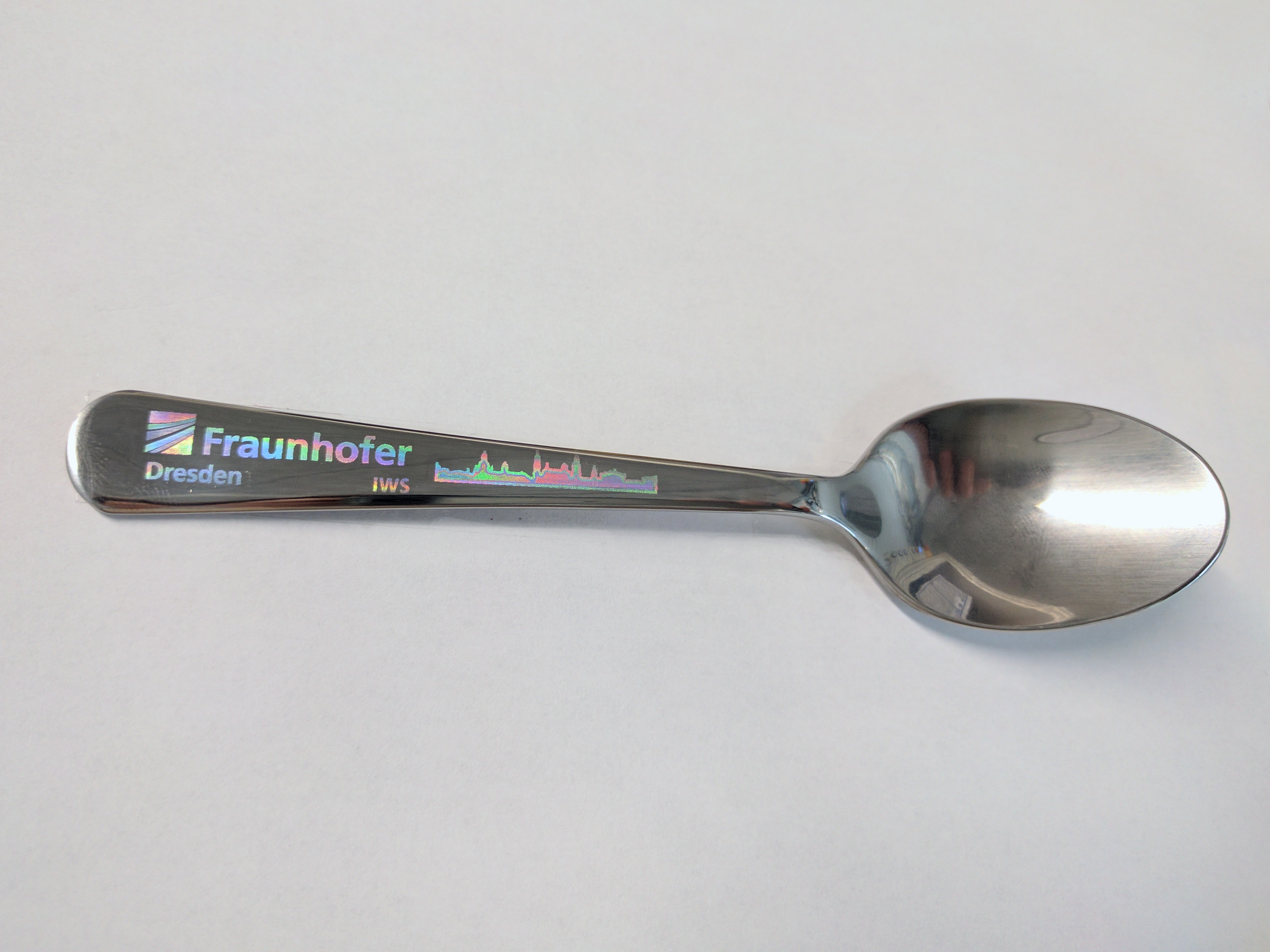 Decorative element „Fraunhofer IWS“ on a spoon