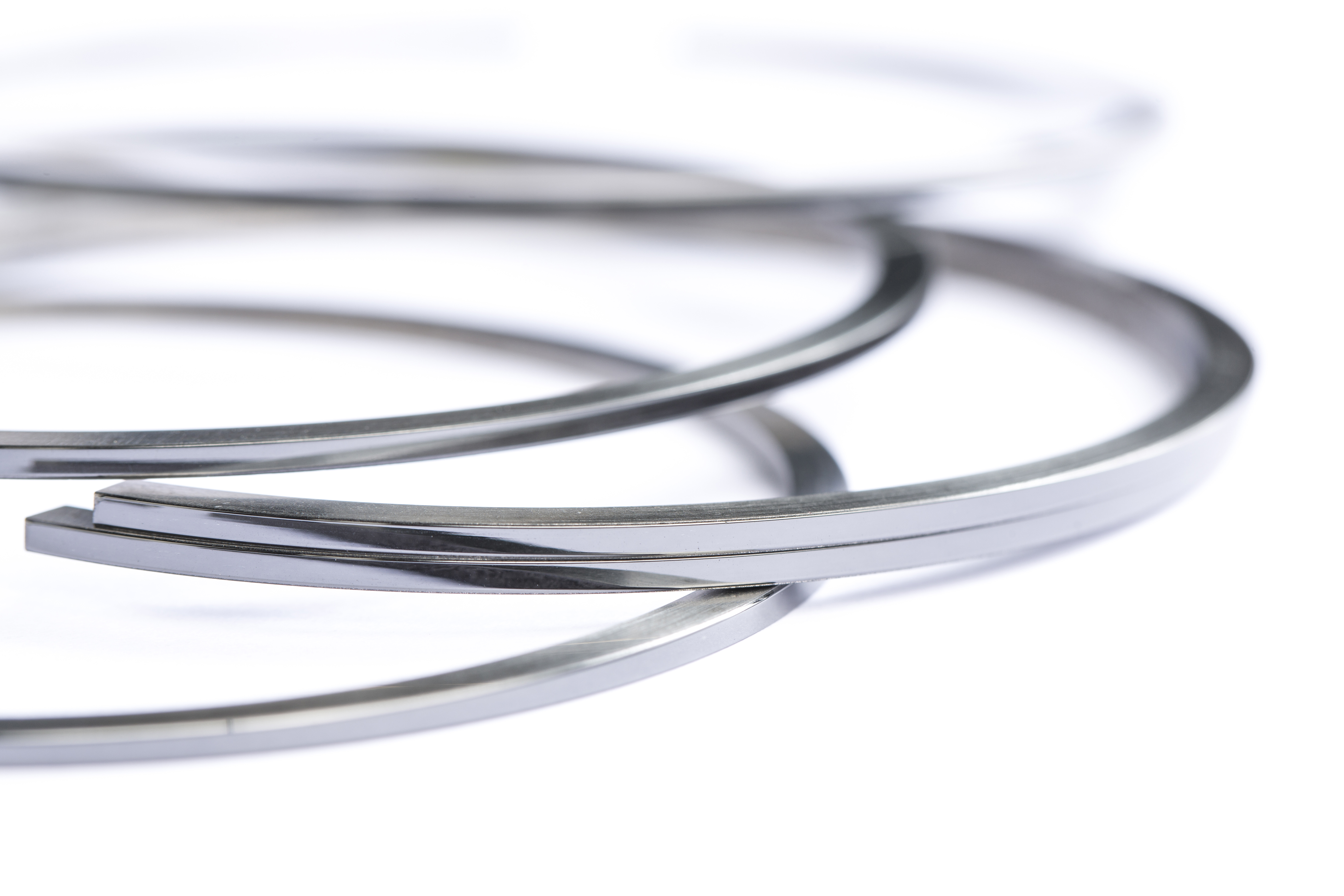 Piston rings coated with ta-C, which can reduce friction in engines by up to 50 percent.