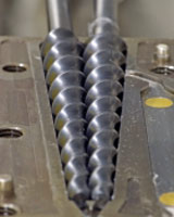 Conical co-rotating twin screws