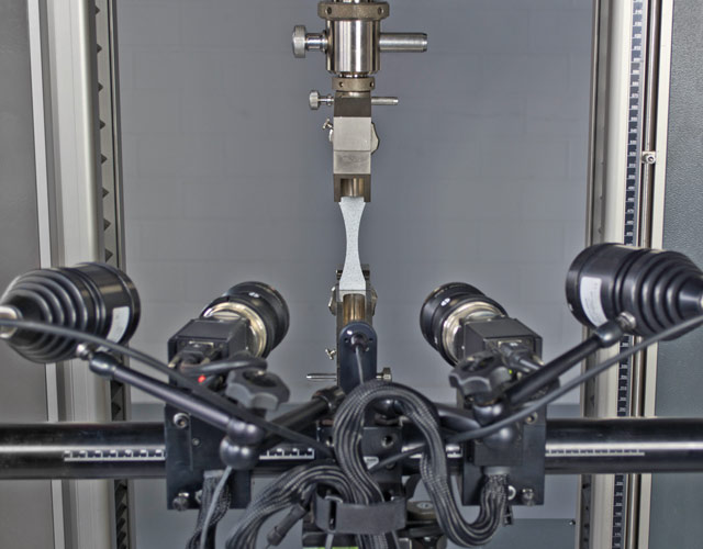 Mechanical characterization of an adhesive bulk sample