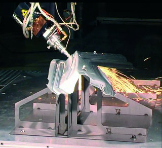 3D laser beam cutting of a passenger car B-pillar.