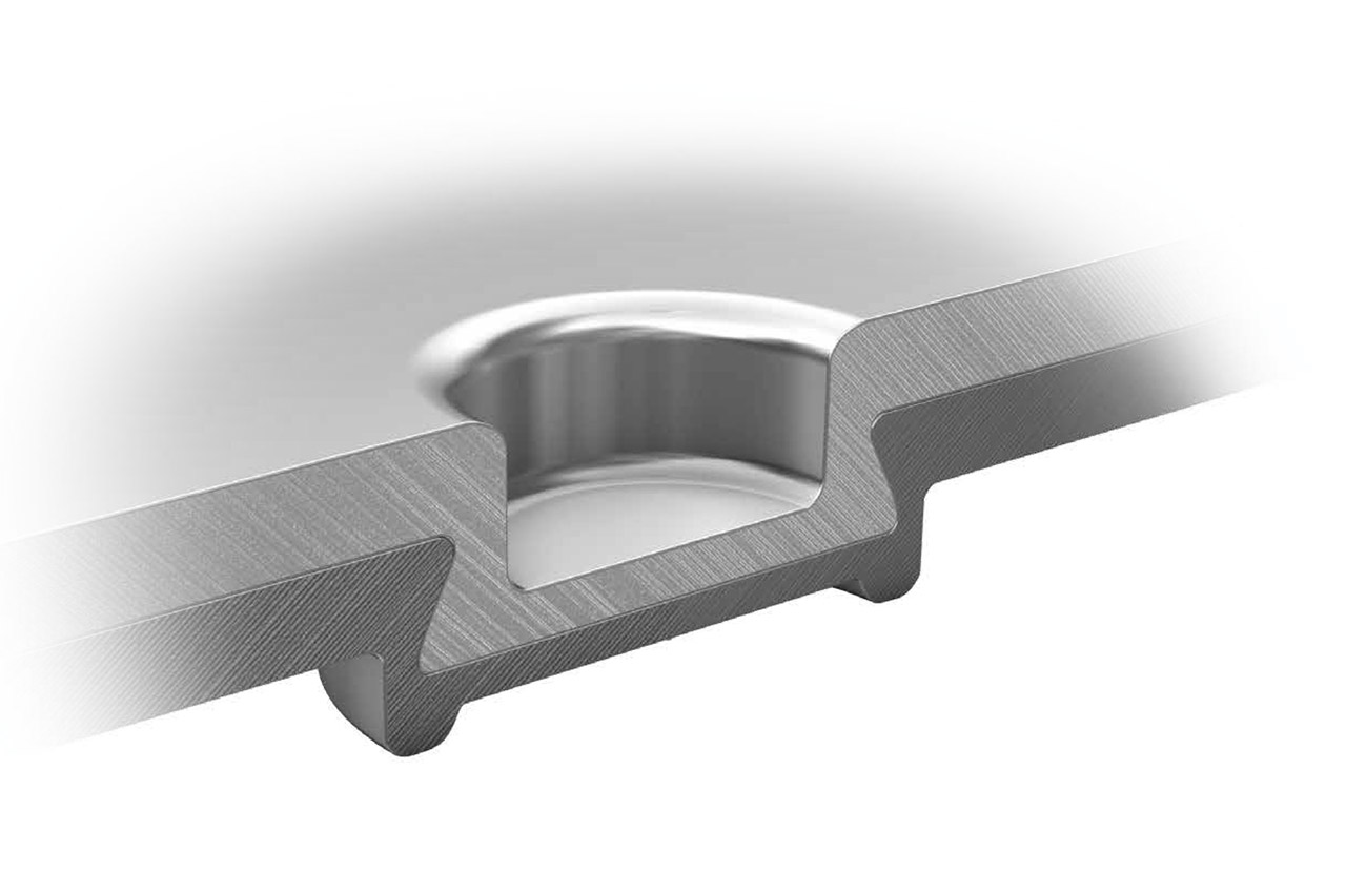Model view of a clinch point with which two different materials were joined by a form and force fit. Model view of a clinch point with which two different materials were joined by a form and force fit.