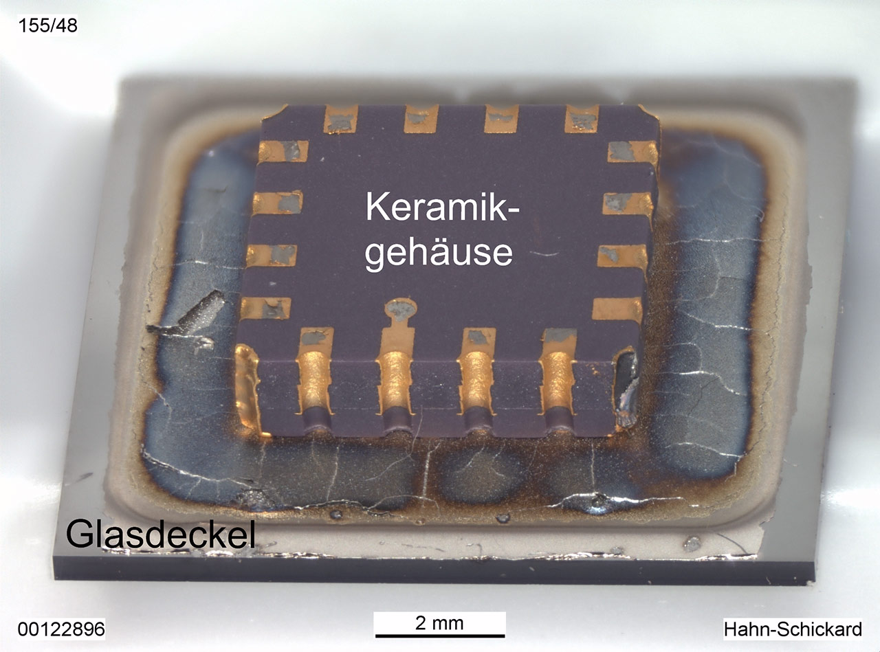 LCC01627 ceramic housing with reactively joined borosilicate glass lid chip.