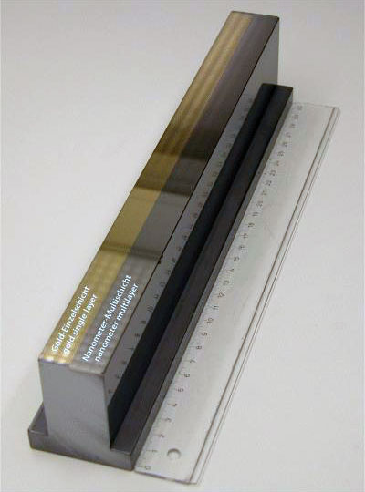 Synchrotron mirror with total internal reflection coating (gold) and nanometer multilayer system (Mo/Si)