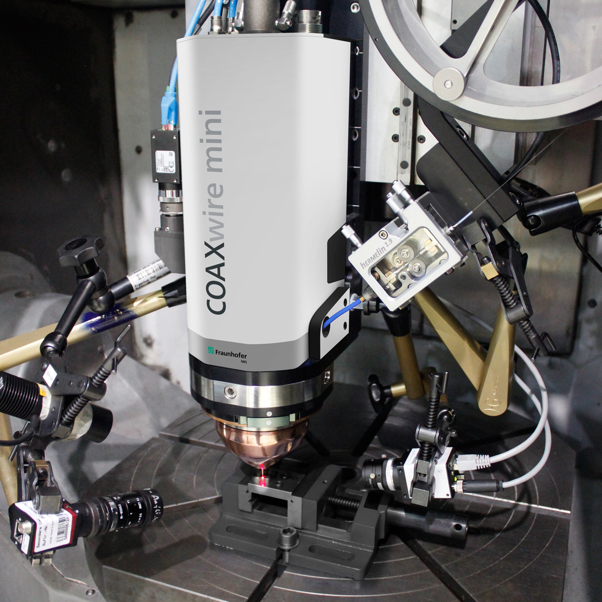 Integration of the COAXwire mini in a 5-axis CNC system.